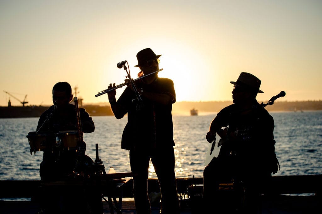 Photo from Get Started SD 2017 of musicians playing in the sunset on Broadway Pier