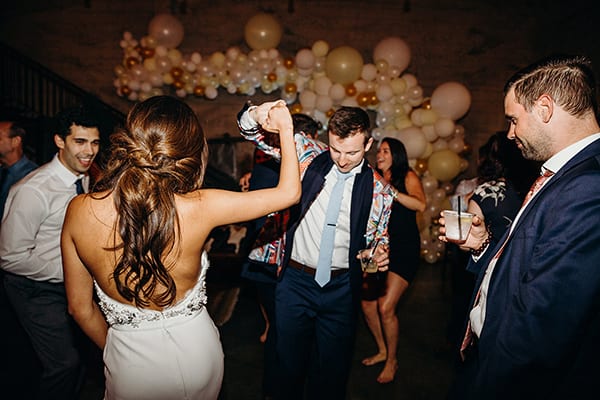 bride and groom dancing, cater weddings and events | snake oil cocktail co.